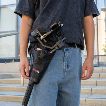 Black Gimbal Holster worn on belt for videographers